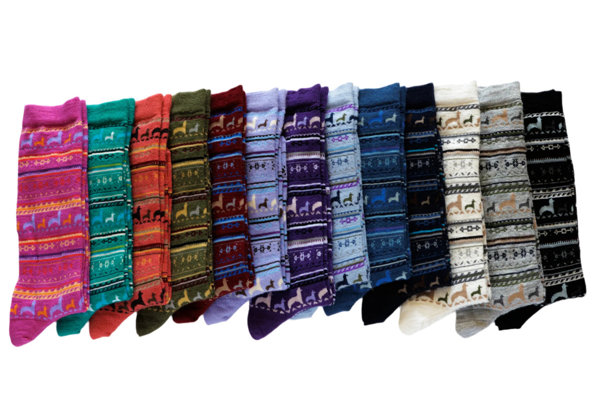 Photo of all colors available of alpaca print crew socks pink, mint green, orange, brown, black, light brown, light purple, dark purple and white and grey