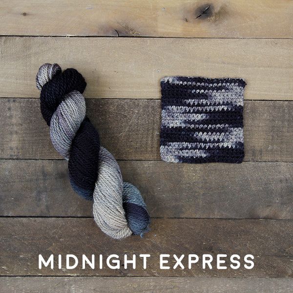 photo of braided midnight express that is a light gray and black. also shown is a finished braided matt a few inches by a few inches